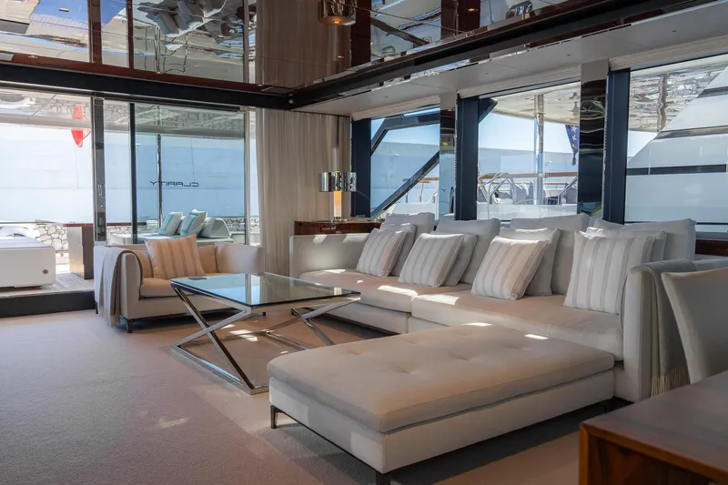  Yacht Photos Pics Luxurious interior of 2022 Riva 90' Argo yacht with elegant seating and modern decor.