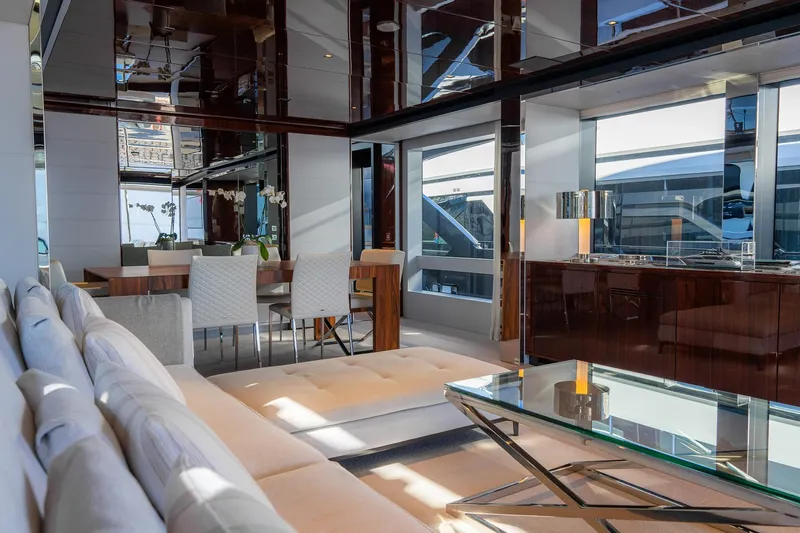  Yacht Photos Pics Luxurious interior of 2022 Riva 90' Argo yacht with modern furnishings and elegant design.