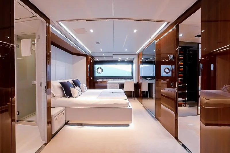  Yacht Photos Pics Luxurious interior of 2022 Riva 90' Argo yacht with elegant bedroom and modern design.
