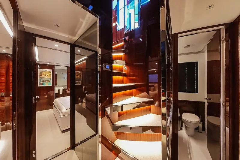  Yacht Photos Pics Luxurious interior of 2022 Riva 90' Argo yacht featuring modern design and elegant lighting.