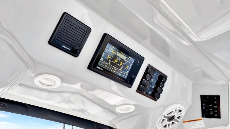 All Jack'd Up Yacht Photos Pics 2023 Pursuit S 428 Sport boat dashboard with Garmin and Yamaha displays.