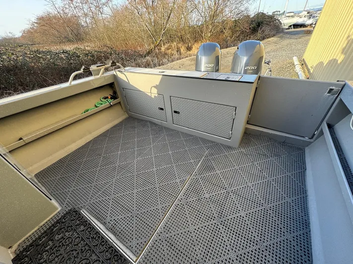  Yacht Photos Pics 2015 River Hawk SH Offshore XL boat deck with dual outboard motors.