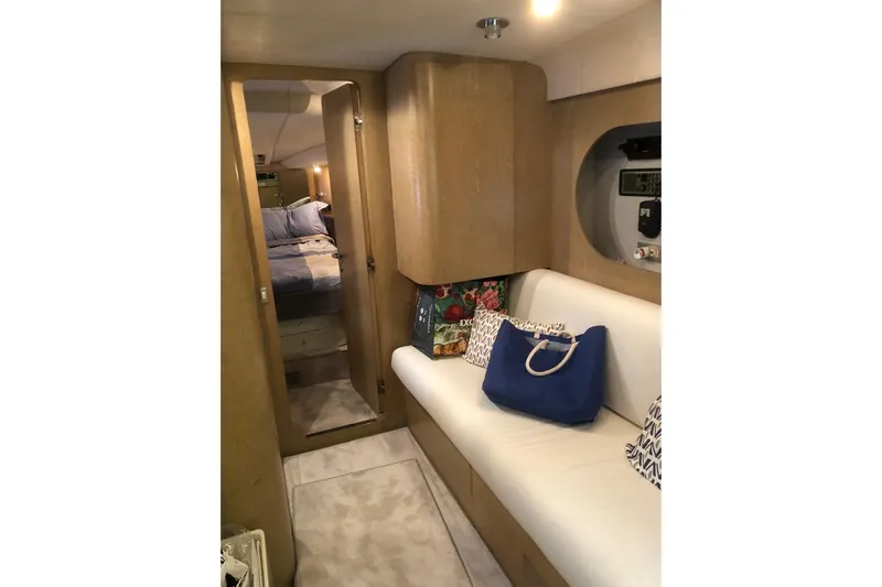  Yacht Photos Pics Interior of 1992 Riva TROPICANA 43 yacht with cozy seating and stylish decor.
