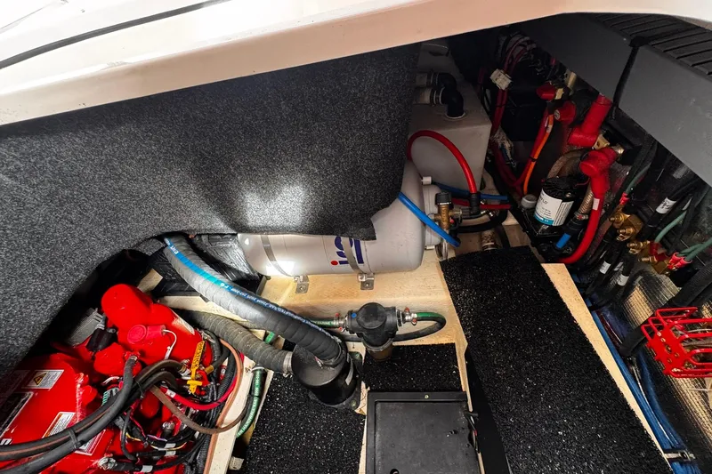  Yacht Photos Pics Engine compartment of a 2021 Regal 26 XO boat, showcasing wiring and components.