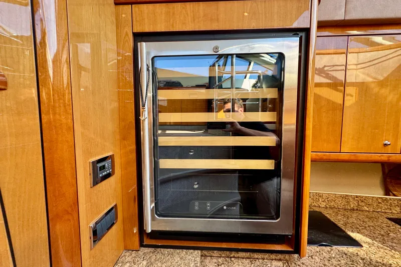 Why Not Yacht Photos Pics Luxury yacht Sunseeker Manhattan 50 interior with built-in wine cooler, 2005 model.