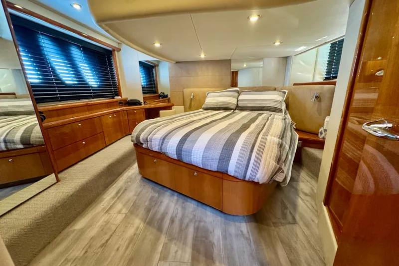 Why Not Yacht Photos Pics Luxurious bedroom interior of 2005 Sunseeker Manhattan 50 yacht with modern decor.