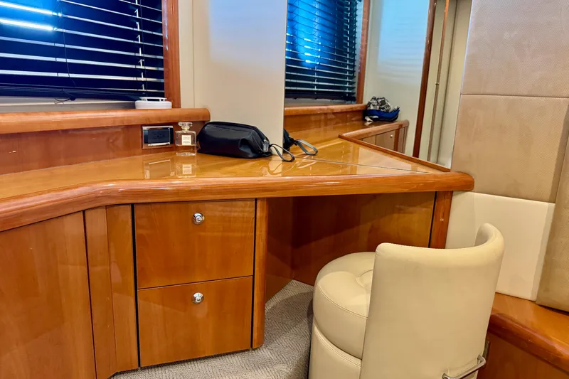 Why Not Yacht Photos Pics Luxurious interior of 2005 Sunseeker Manhattan 50 yacht with wooden desk and chair.