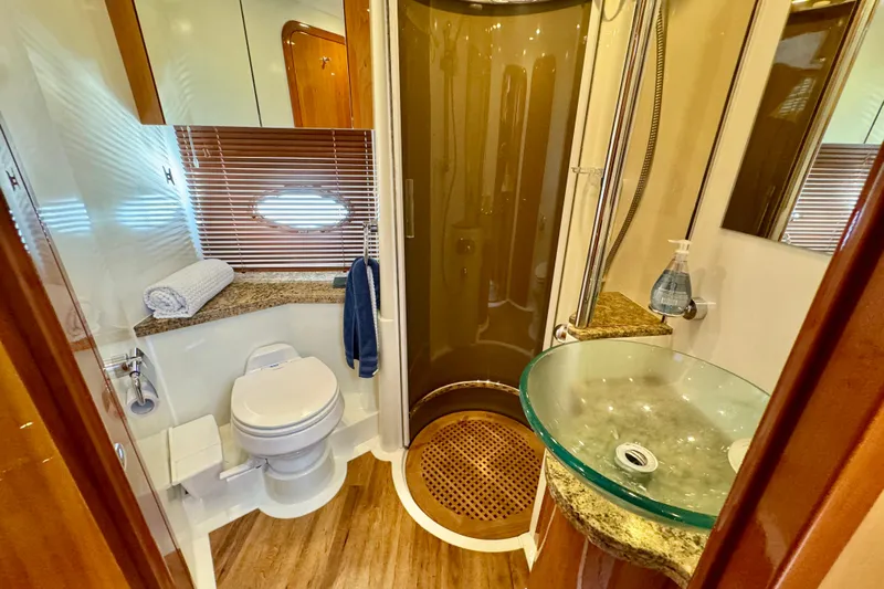 Why Not Yacht Photos Pics Luxurious bathroom in 2005 Sunseeker Manhattan 50 yacht with modern fixtures and elegant design.