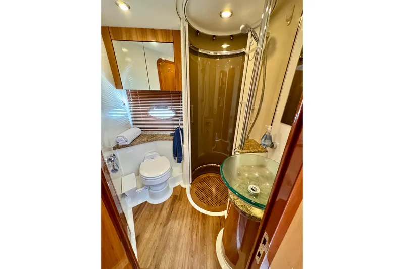 Why Not Yacht Photos Pics Luxurious bathroom in 2005 Sunseeker Manhattan 50 yacht with modern fixtures and elegant design.