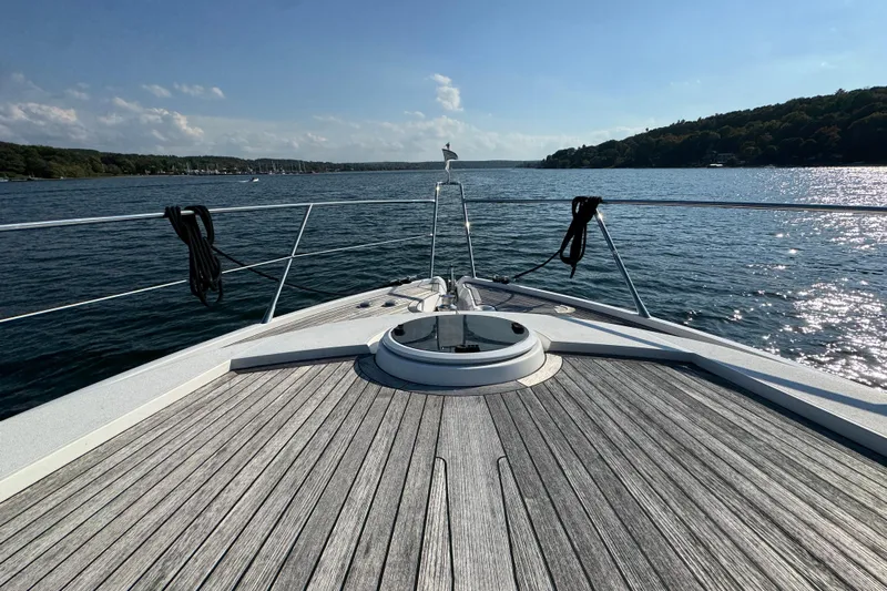 Why Not Yacht Photos Pics Bow view of 2005 Sunseeker Manhattan 50 yacht on a sunny day at sea.