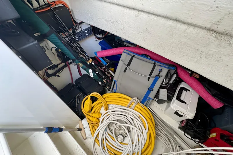 Why Not Yacht Photos Pics Storage area of a 2005 Sunseeker Manhattan 50 yacht with equipment and cables.