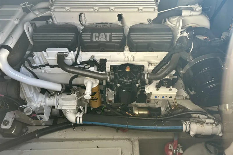 Why Not Yacht Photos Pics Engine compartment of a 2005 Sunseeker Manhattan 50 yacht, featuring a CAT engine.