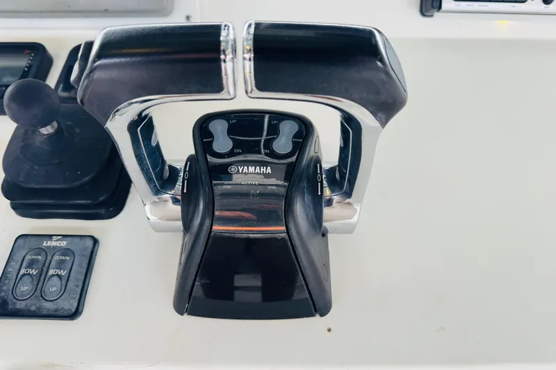  Yacht Photos Pics Yamaha throttle controls on a 2008 Intrepid 327 boat dashboard.