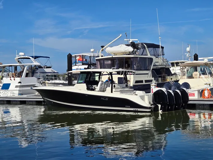  Yacht Photos Pics 2018 HCB 42 Siesta boat docked in marina, sunny day.