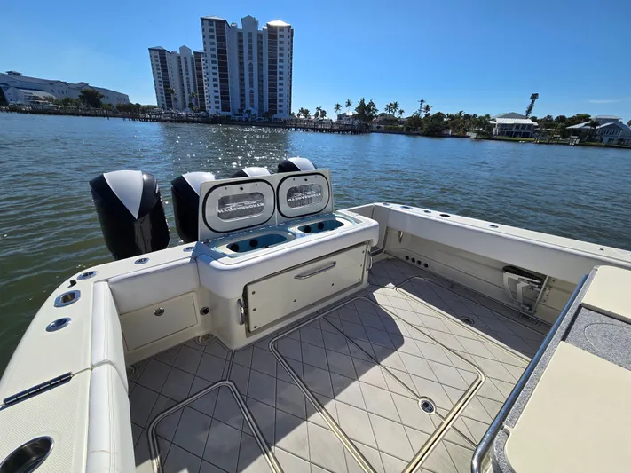  Yacht Photos Pics HCB 42 Siesta 2018 boat with engines and city view.