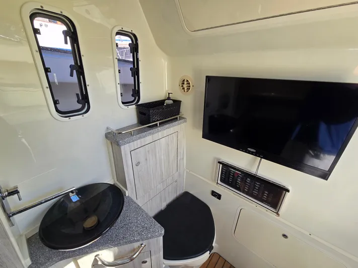  Yacht Photos Pics Interior of 2018 HCB 42 Siesta with sink and TV.