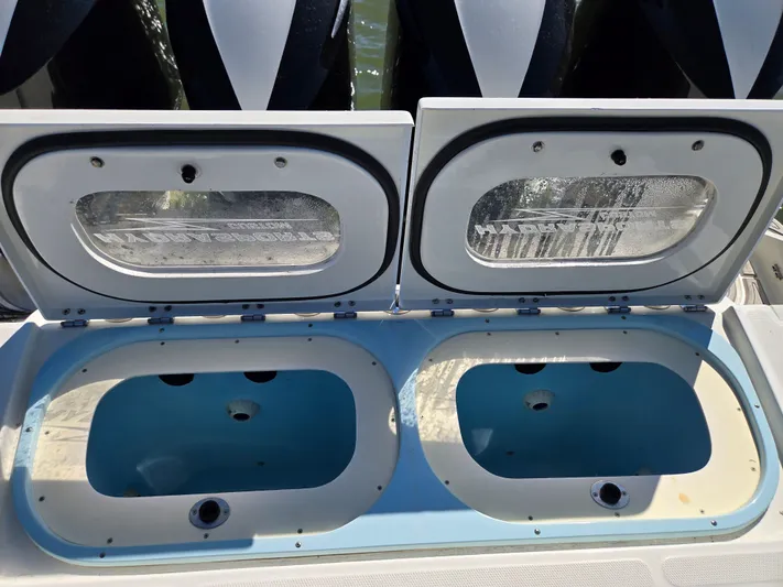  Yacht Photos Pics Open fish compartments on a 2018 HCB 42 Siesta boat.