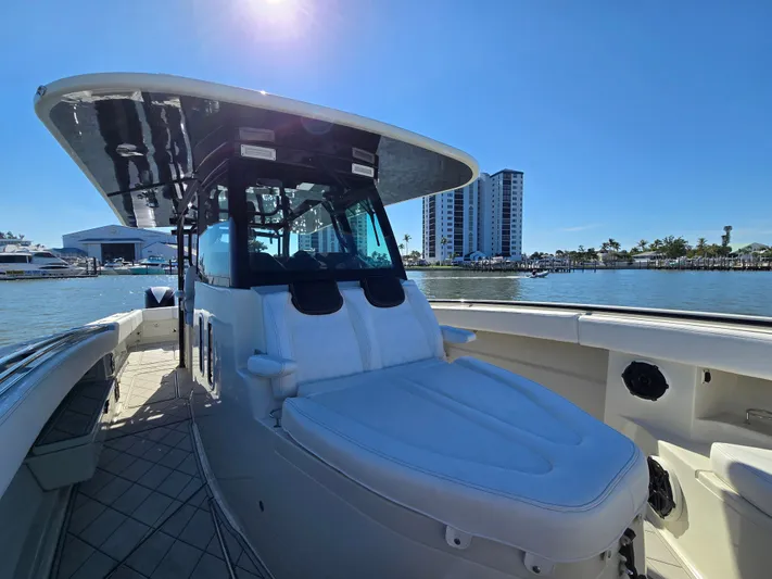  Yacht Photos Pics 2018 HCB 42 Siesta boat on sunny waters with city view.