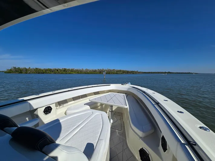  Yacht Photos Pics HCB 42 Siesta 2018 on calm waters with blue sky.