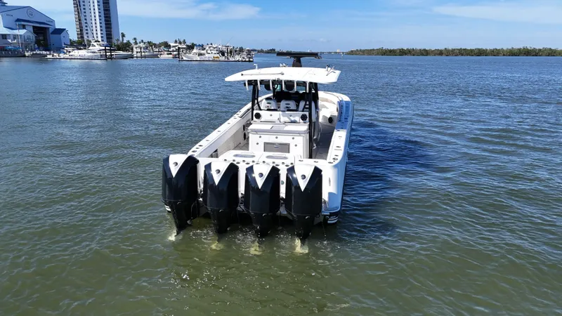 Yacht Photos Pics HCB 42 Siesta 2018 boat with four outboard engines on the water.