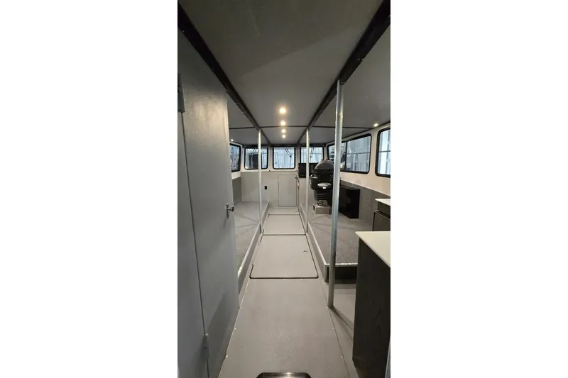  Yacht Photos Pics Interior of a 1990 custom rebuilt dive boat, featuring spacious layout and modern design.