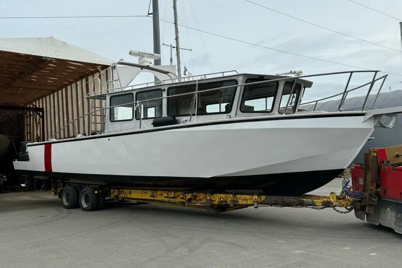  Yacht Photos Pics Custom 1990 rebuilt dive boat on trailer, ready for offshore adventures.