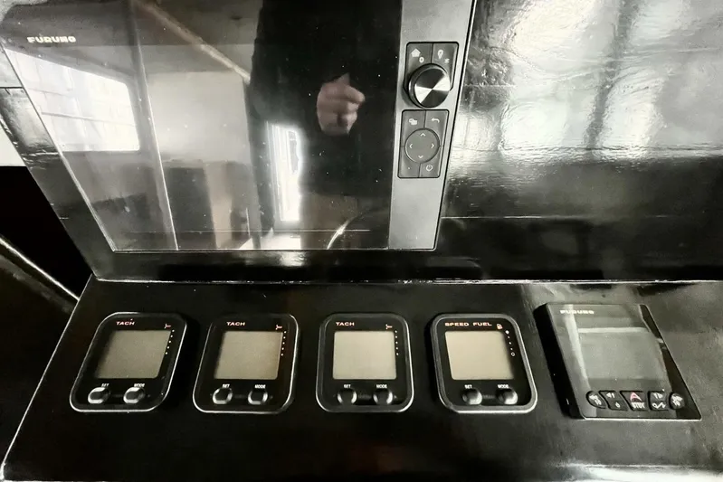  Yacht Photos Pics Control panel of a 1990 custom rebuilt dive boat with tachometers and speed fuel gauges.