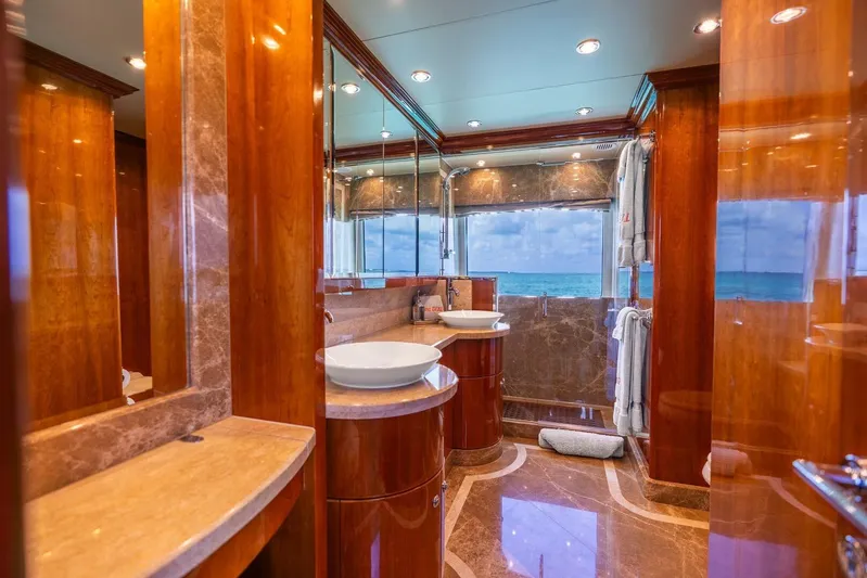 Done Deal Yacht Photos Pics Luxurious bathroom on 2010 Hargrave Raised Pilothouse yacht with ocean view.