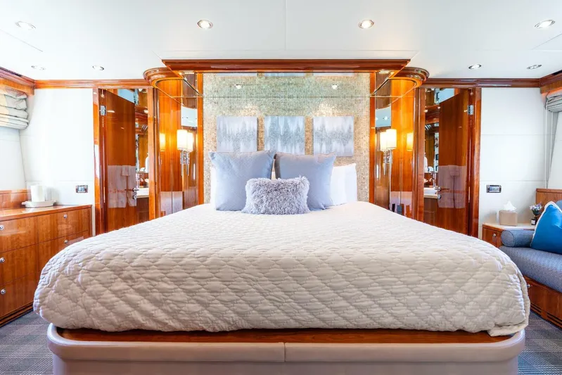 Done Deal Yacht Photos Pics Luxurious bedroom in 2010 Hargrave Raised Pilothouse yacht with elegant wood finishes.