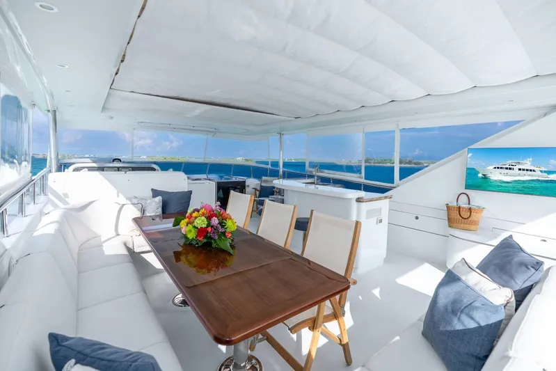 Done Deal Yacht Photos Pics Luxurious 2010 Hargrave Raised Pilothouse yacht interior with elegant seating and ocean view.
