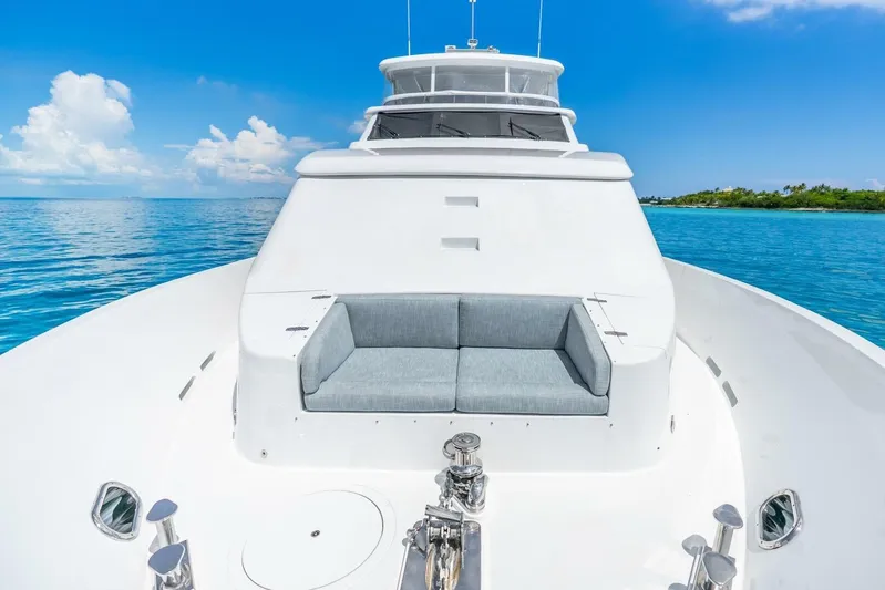 Done Deal Yacht Photos Pics Luxurious 2010 Hargrave Raised Pilothouse yacht on serene blue waters.