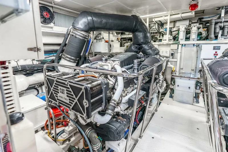 Done Deal Yacht Photos Pics Engine room of 2010 Hargrave Raised Pilothouse yacht with CAT marine power engine.