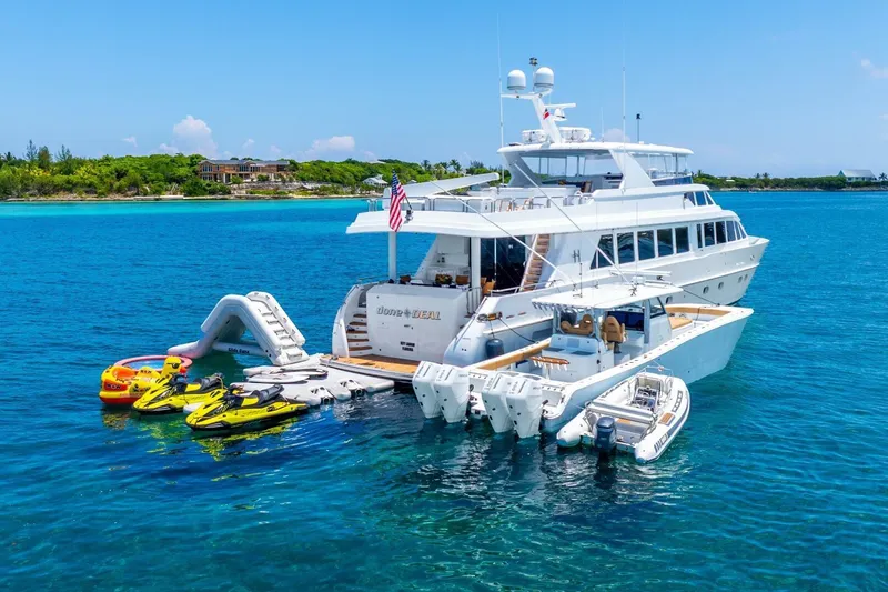 Done Deal Yacht Photos Pics Luxurious 2010 Hargrave Raised Pilothouse yacht with water toys in tropical waters.