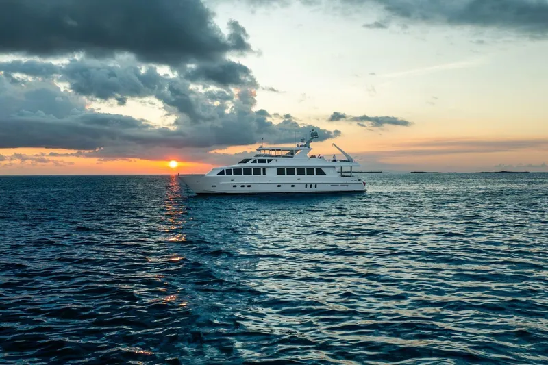 Done Deal Yacht Photos Pics 2010 Hargrave Raised Pilothouse yacht at sunset on the ocean.