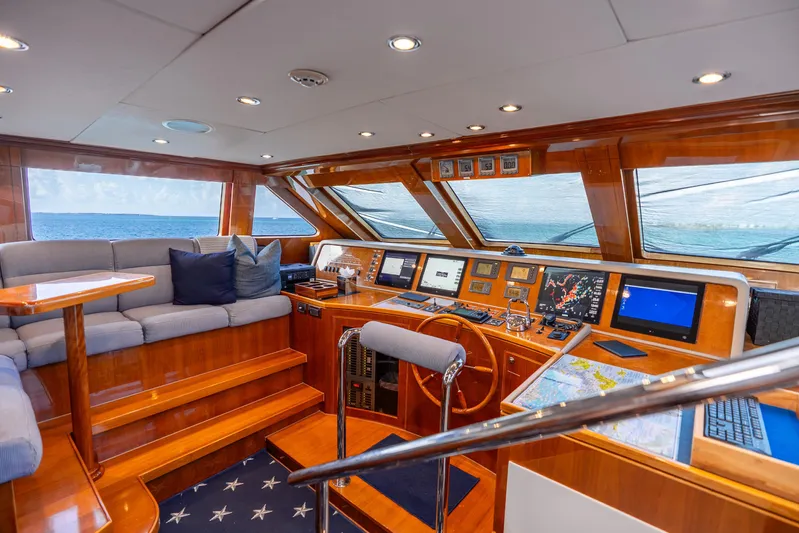 Done Deal Yacht Photos Pics Luxurious 2010 Hargrave Raised Pilothouse interior with navigation equipment and ocean view.