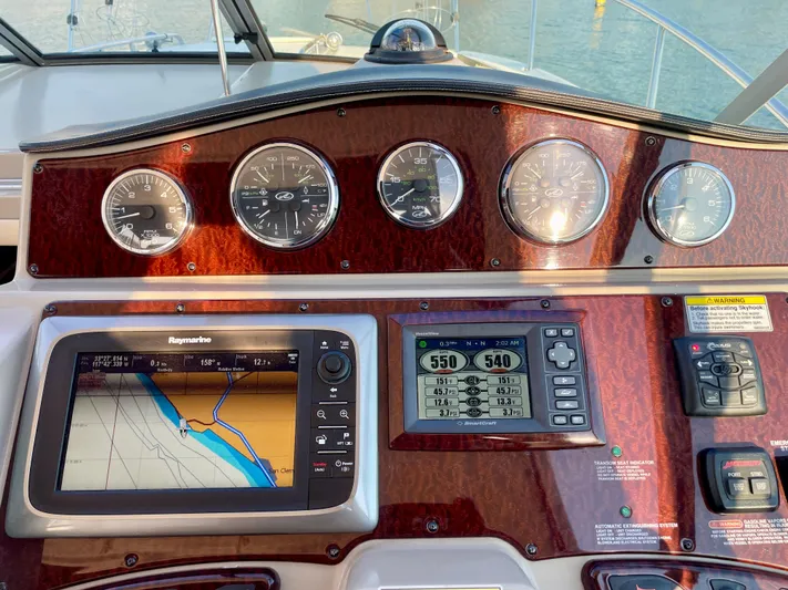 Ilaria Yacht Photos Pics Dashboard of 2014 Sea Ray 330 Sundancer with navigation and control instruments.