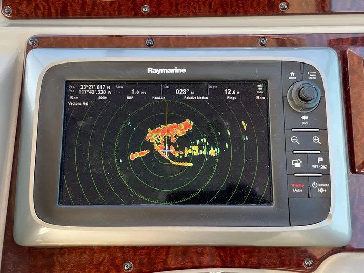 Ilaria Yacht Photos Pics Raymarine navigation display on 2014 Sea Ray 330 Sundancer boat dashboard.