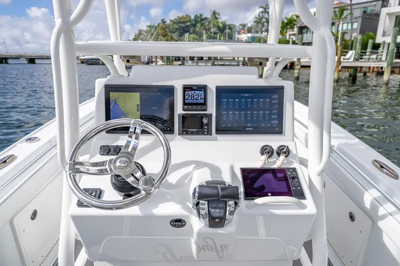  Yacht Photos Pics 2021 Yellowfin 26 Hybrid boat dashboard with advanced navigation and control systems.