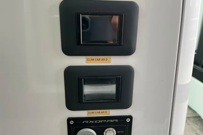  Yacht Photos Pics Control panel of 2023 Axopar 45 Cross Cabine with labeled climate controls.