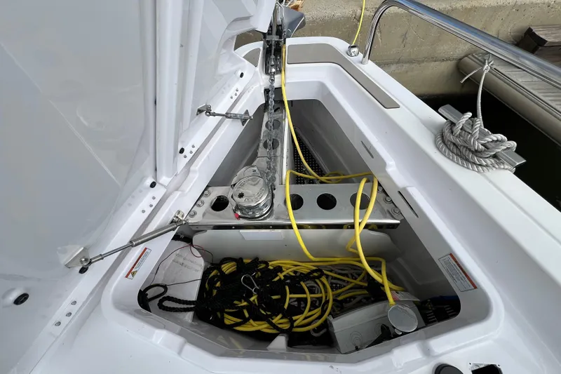  Yacht Photos Pics Anchor compartment of 2023 Axopar 45 Cross Cabine with ropes and cables.