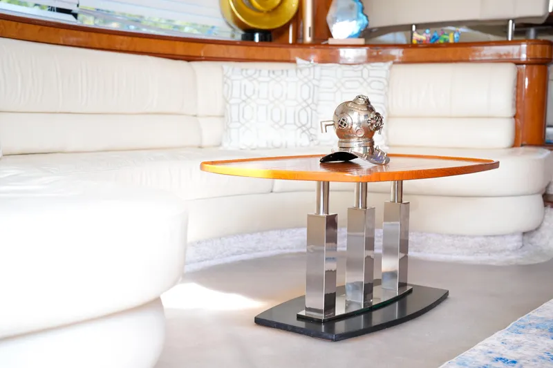 Finesse Yacht Photos Pics Luxurious interior of 2007 Azimut 68E yacht with modern table and elegant seating.