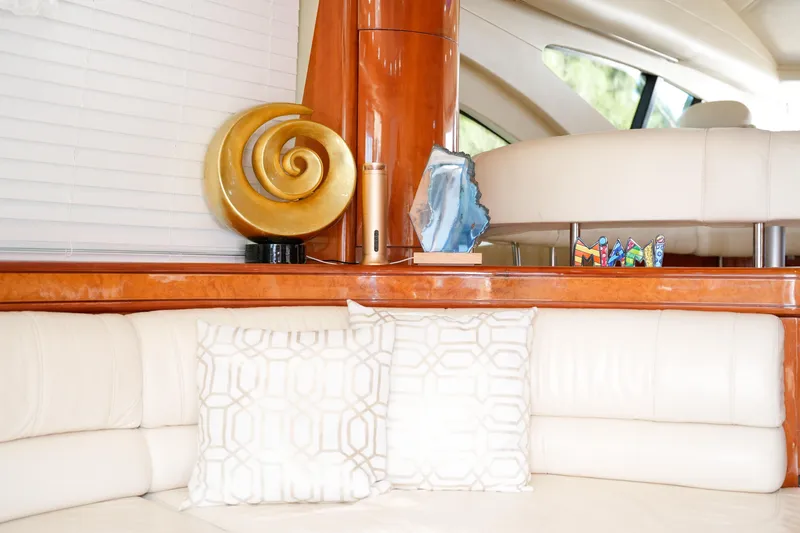 Finesse Yacht Photos Pics Luxurious interior of 2007 Azimut 68E yacht with elegant decor and plush seating.