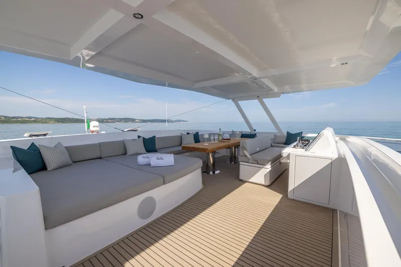  Yacht Photos Pics Silent 60 yacht 2025 model, spacious deck with seating and dining area, ocean view.