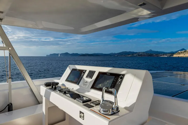 Yacht Photos Pics Silent 60 yacht helm station with ocean and coastal view, 2025 model.