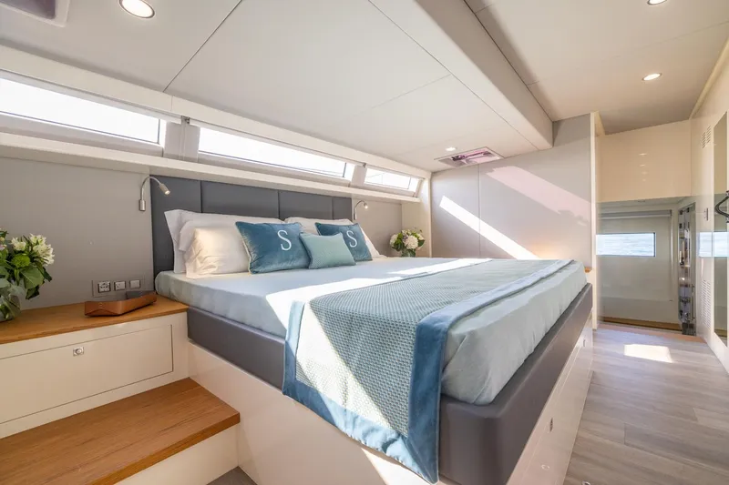  Yacht Photos Pics Luxurious bedroom interior on Silent 60 yacht, 2025 model.