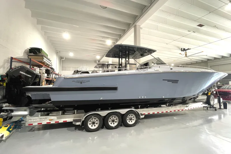  Yacht Photos Pics 2023 Canados 431 GLADIATOR boat on a trailer in a storage facility.