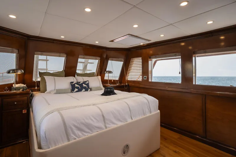 Black Pepper Yacht Photos Pics Luxurious bedroom interior on 1975 Lavagna round stern motoryacht with ocean view.