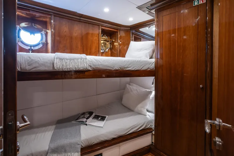 Black Pepper Yacht Photos Pics Luxurious wooden cabin with bunk beds on a 1975 Lavagna motoryacht.