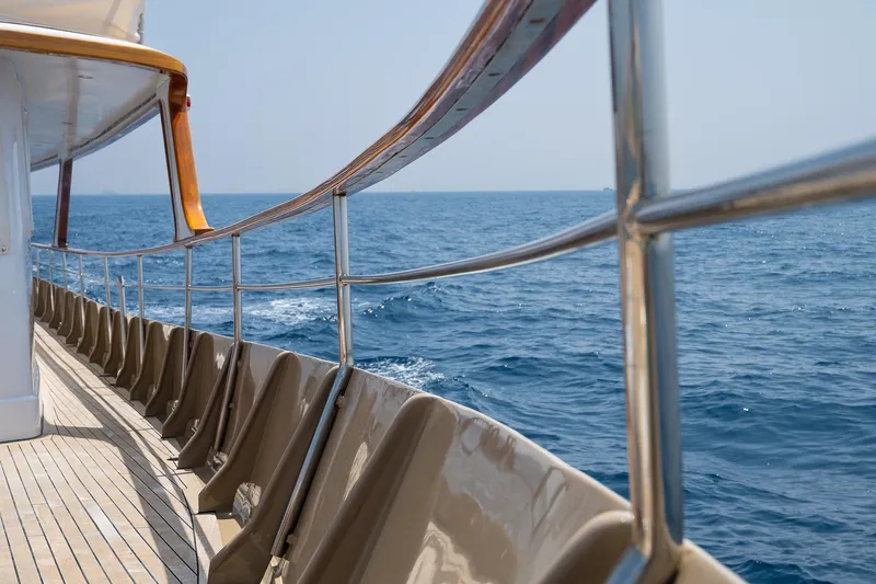 Black Pepper Yacht Photos Pics 1975 Lavagna round stern motoryacht deck with ocean view.