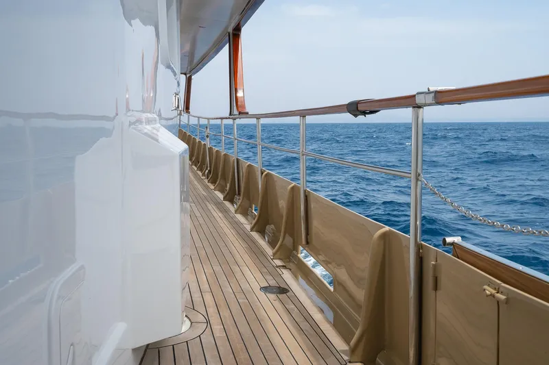 Black Pepper Yacht Photos Pics 1975 Lavagna round stern motoryacht deck with ocean view.